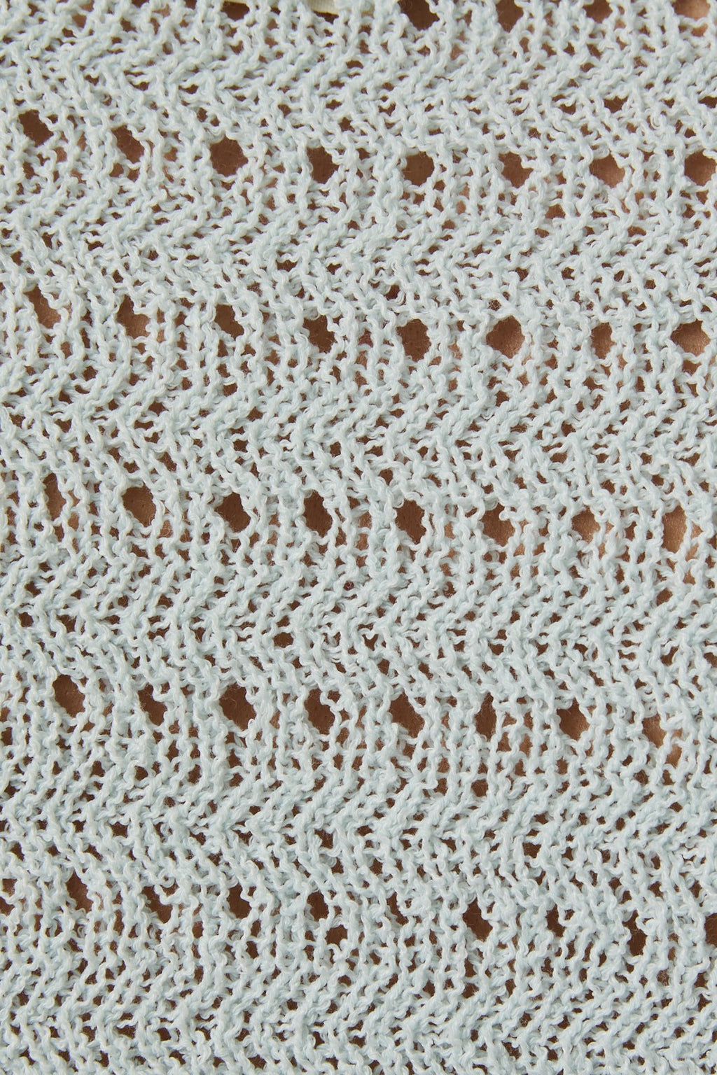 Close-up of a open weave pointelle knit design