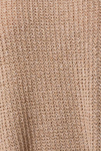 Close-up of taupe woven fabric texture of top with side slits