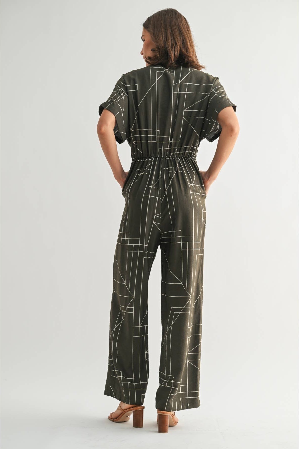 Women's geometric print olive jumpsuit with attached tie sash
