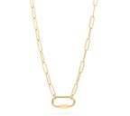 Gold paperclip carabiner chain necklace with a lock clasp on a white background