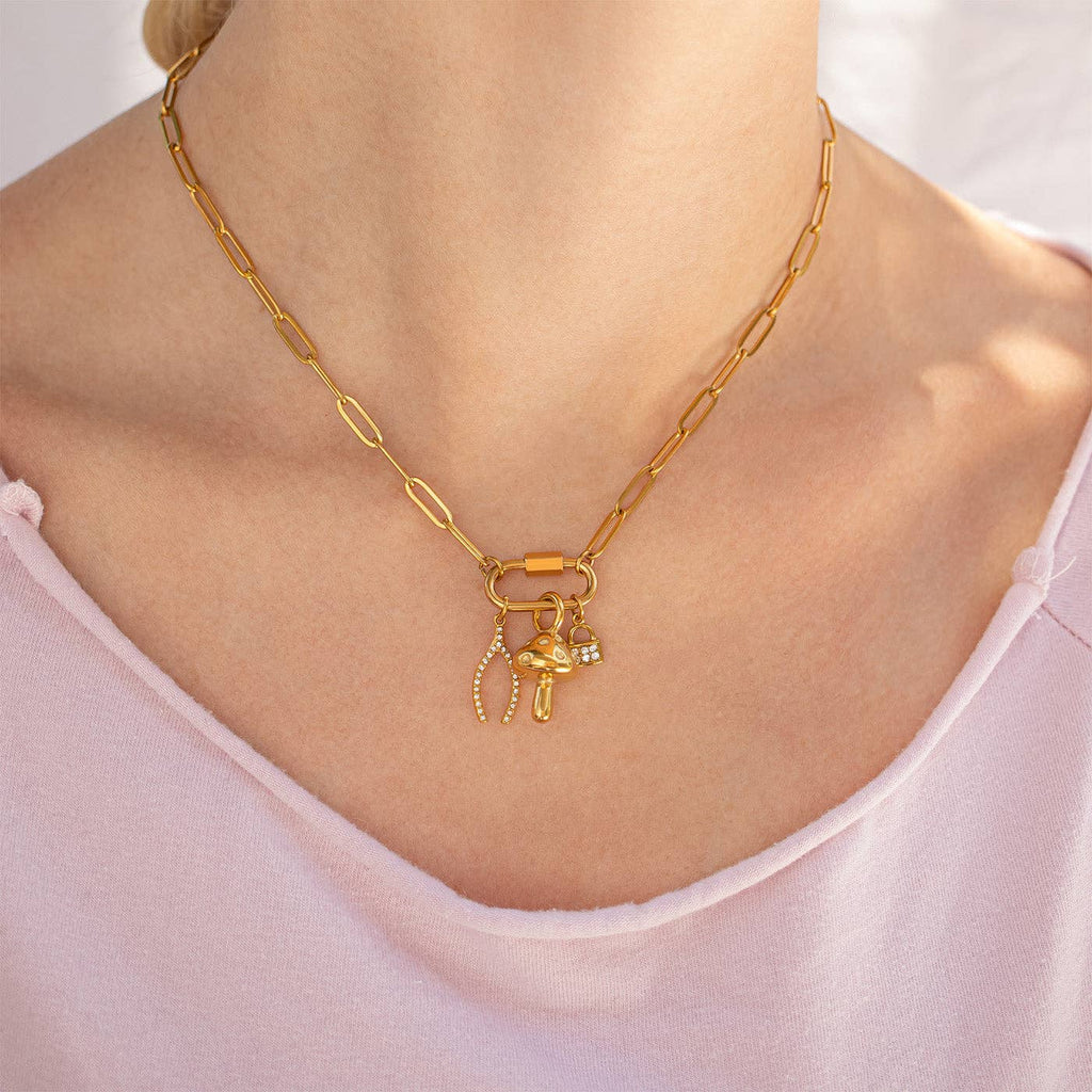 Woman wearing paperclip carabiner with charms