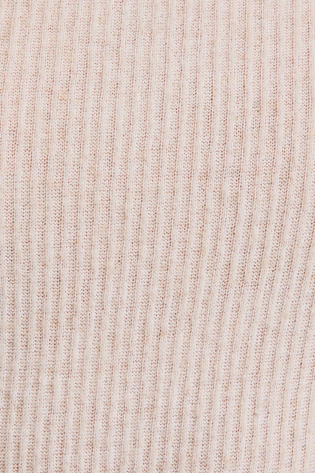Close-up of oatmeal mock neck ribbbed knit fabric