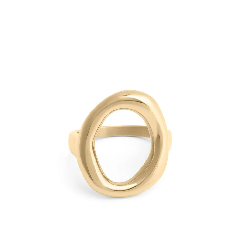 Gold ring with an oval motif design on a white background
