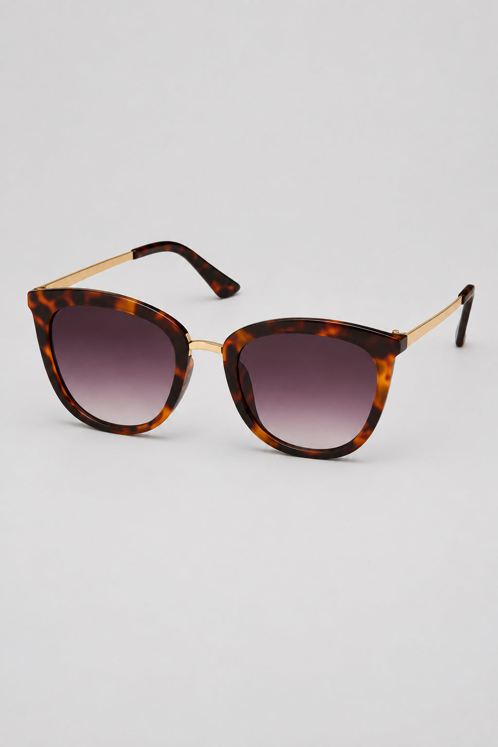 Dark tortoise frames with metal side arms sunglasses against a white background