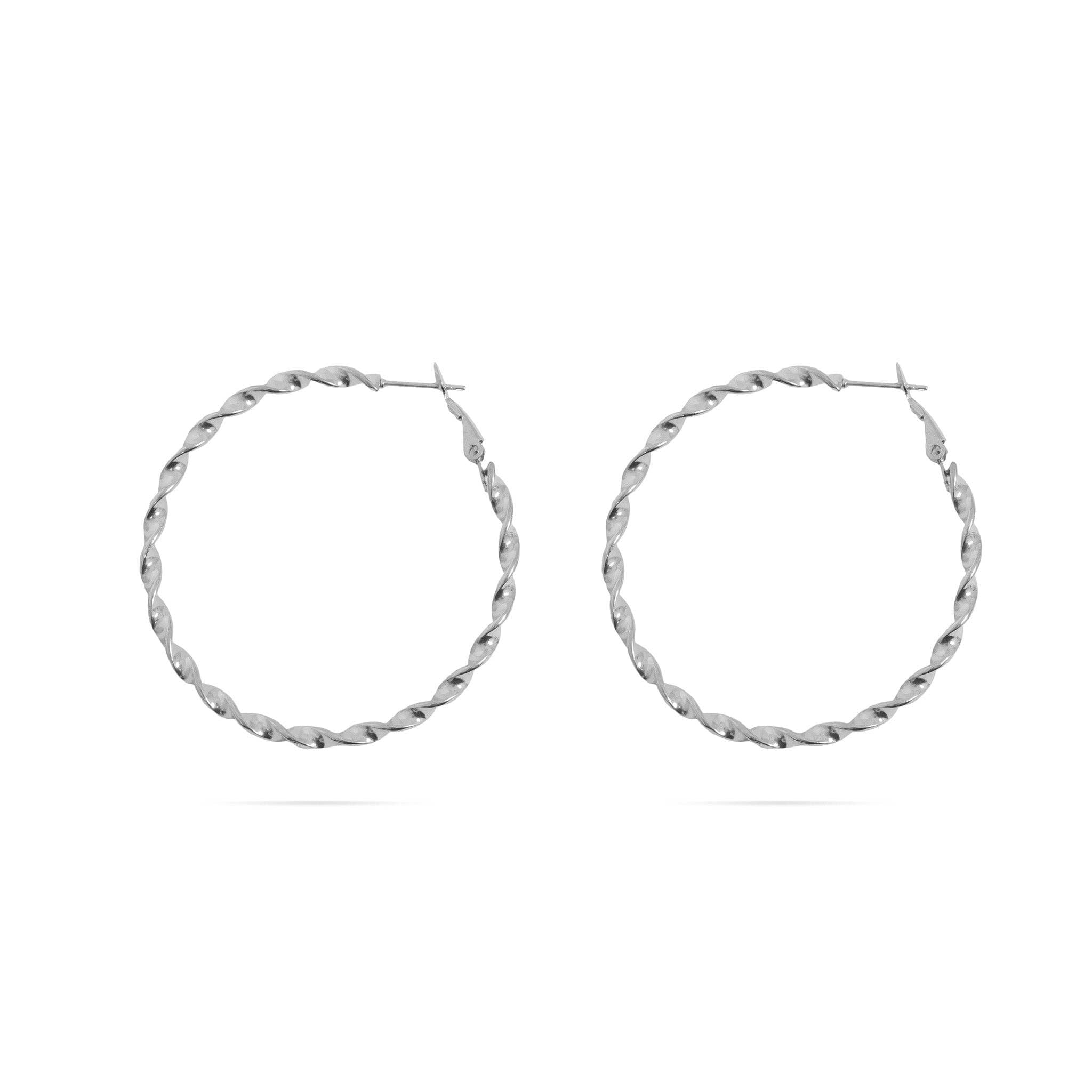 Pair of silver twisted hoop earrings on a white background