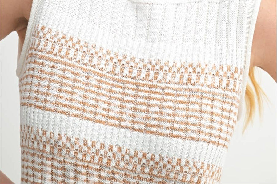 Close up of striped ivory and  brown textured sweater dress fabric