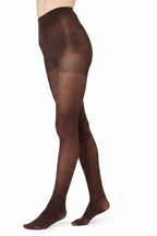 A side profile view of a model's legs wearing sheer dark brown tights against a solid white background.