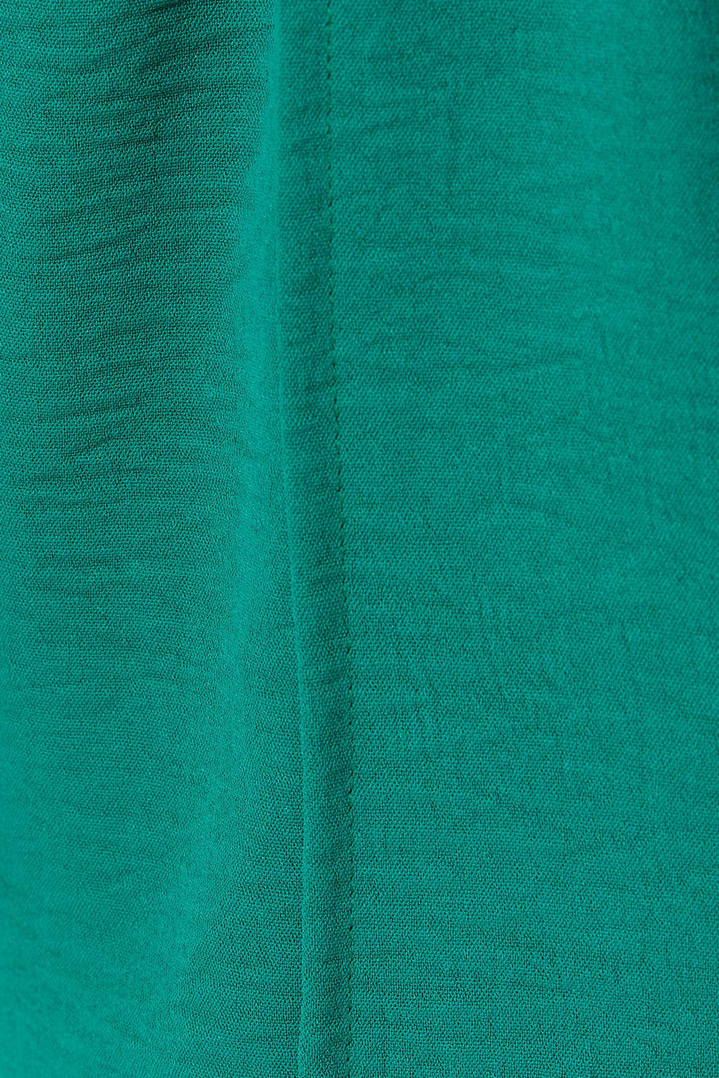 Close-up of hunter green airflow fabric