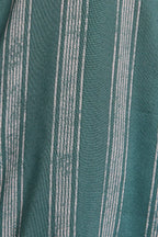 Close up of green and cream striped fabric 