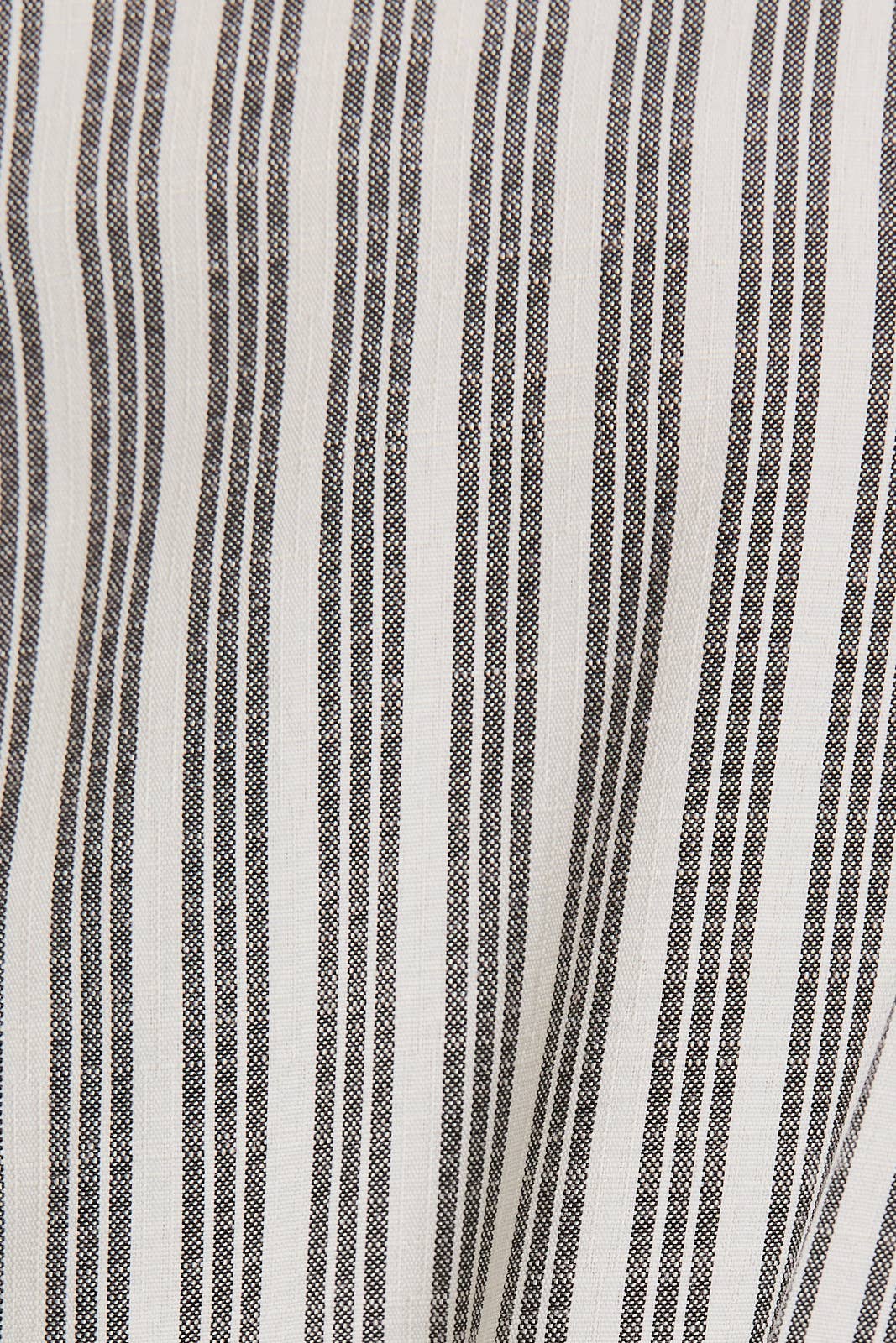 Close-up of black and white striped fabric texture
