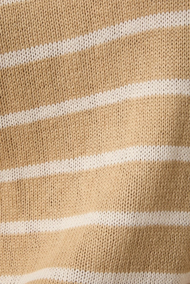 Close-up of tan knit sweater fabric  with cream stripes