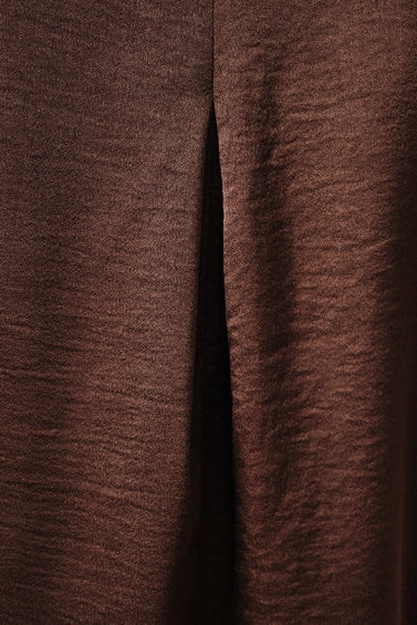 Close-up of a brown crinkle satin fabric 