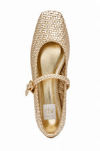 Gold woven ballet flat with single strap and buckle against a white background