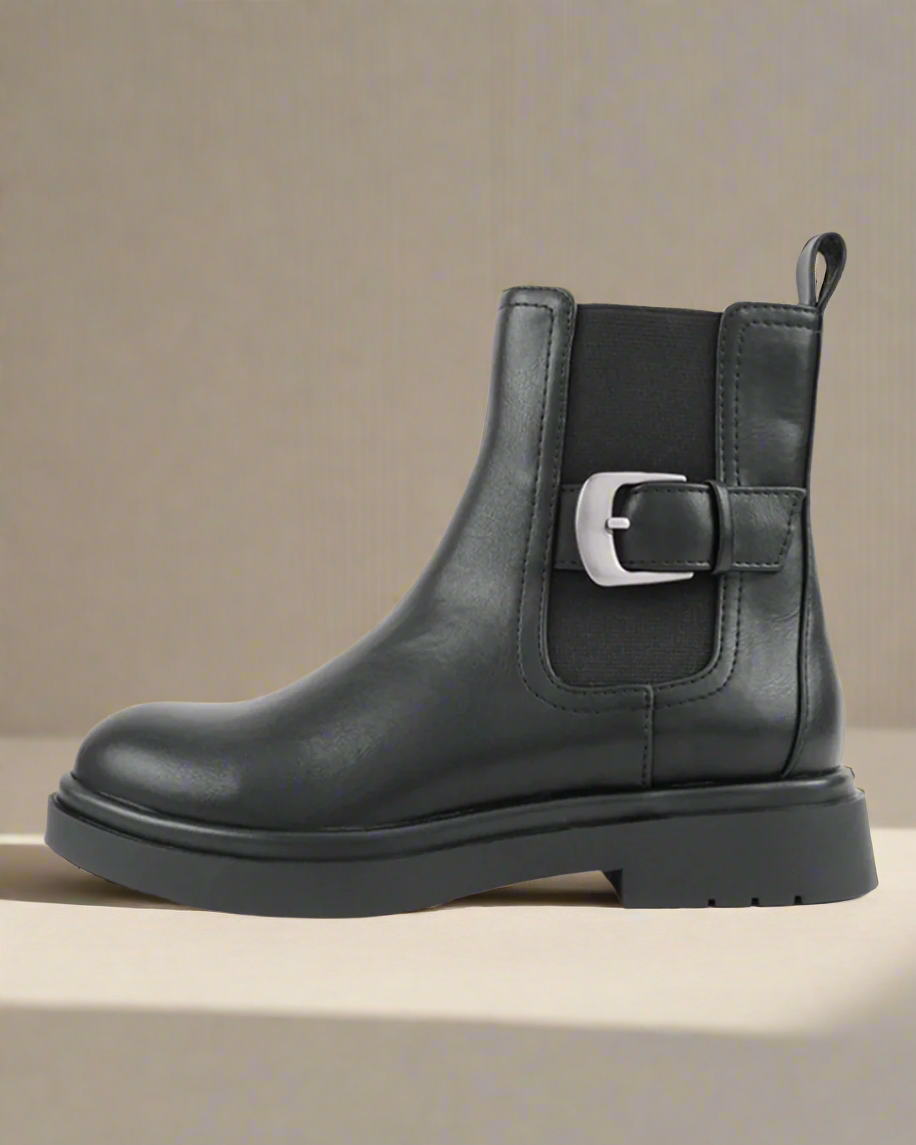 Black leather boot with a side buckle and elastic panel