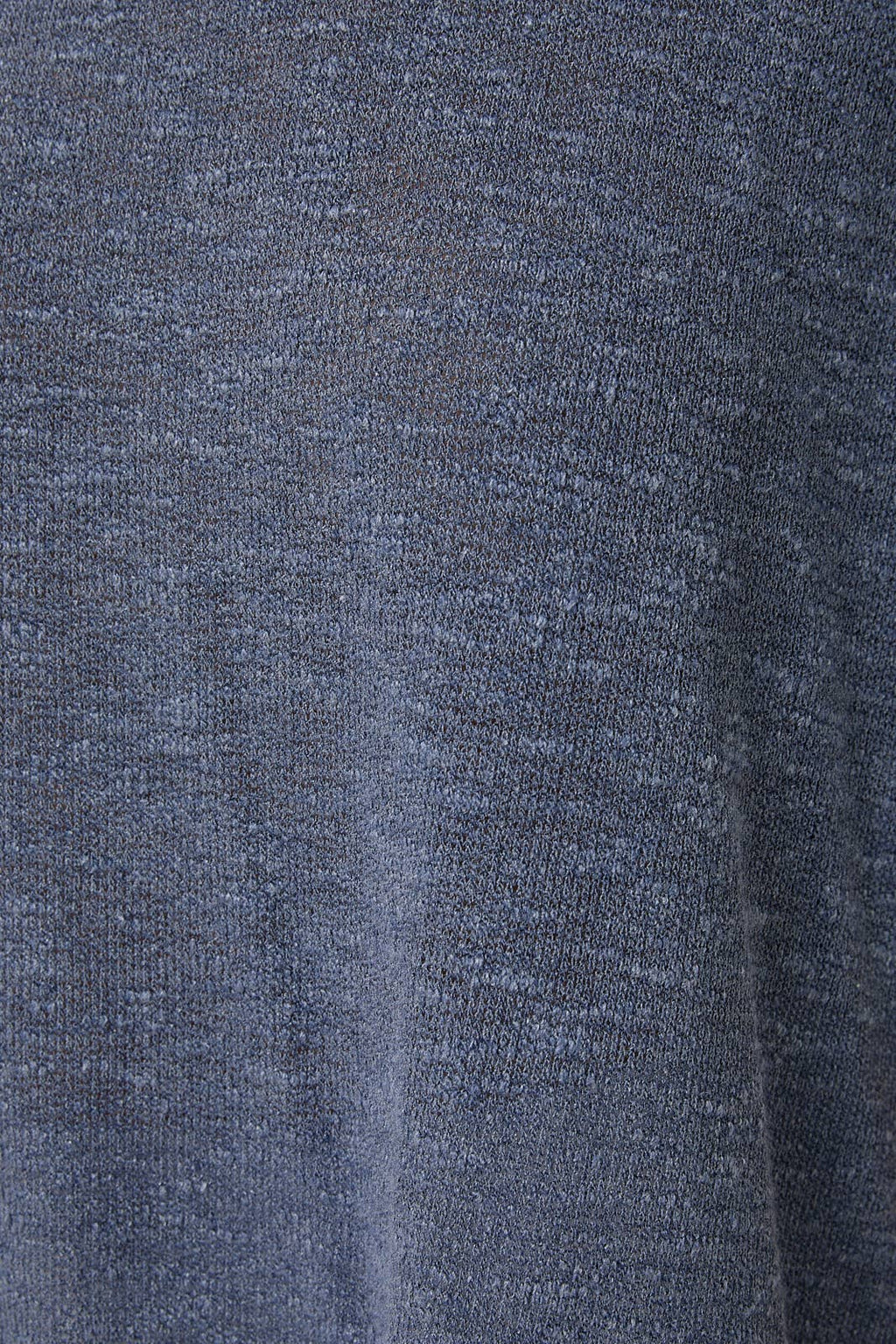 Close-up of a textured indigo knit  fabric surface