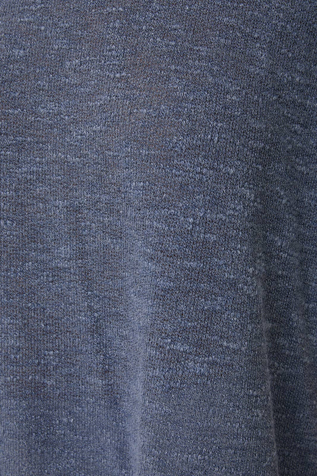 Close-up of a textured indigo knit  fabric surface