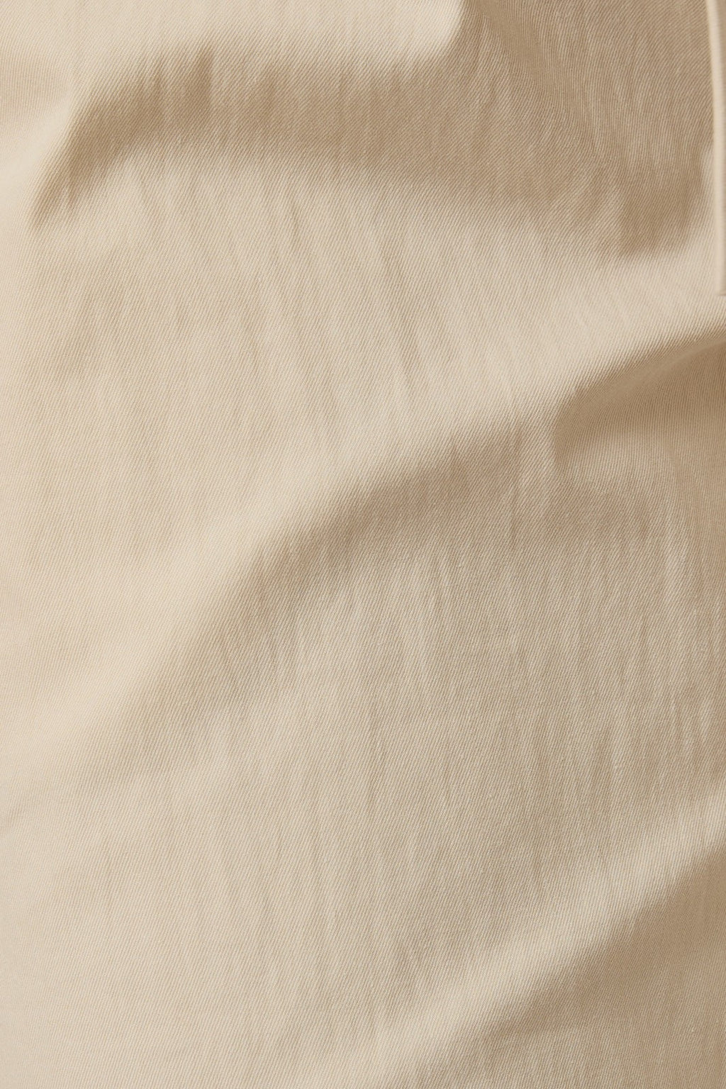 Close up of ecru twill pants
