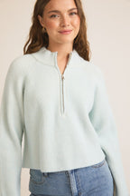 Woman wearing Mock Neck Zip Up Ribbed Sweater-Ice Blue