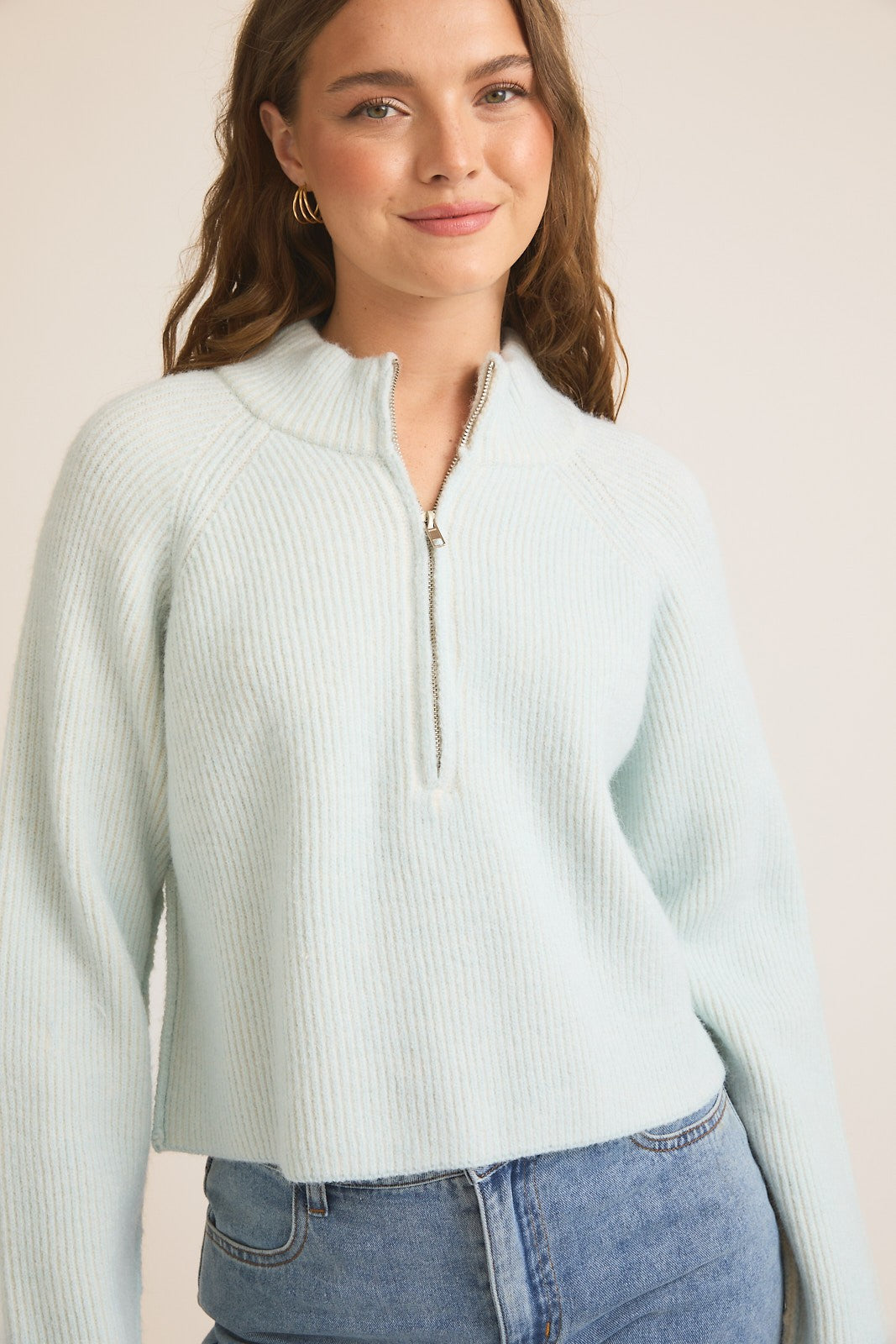Woman wearing Mock Neck Zip Up Ribbed Sweater-Ice Blue