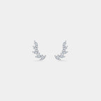 A pair of silver plated crescent-shaped stud earrings set with marquise-cut cubic zirconia, displayed on a light gray background.