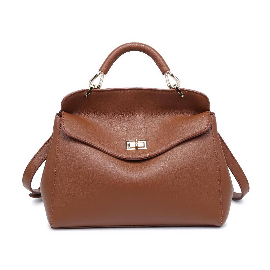Brown vegan leather handbag/crossbody with curved flap and gold hardware on a white background