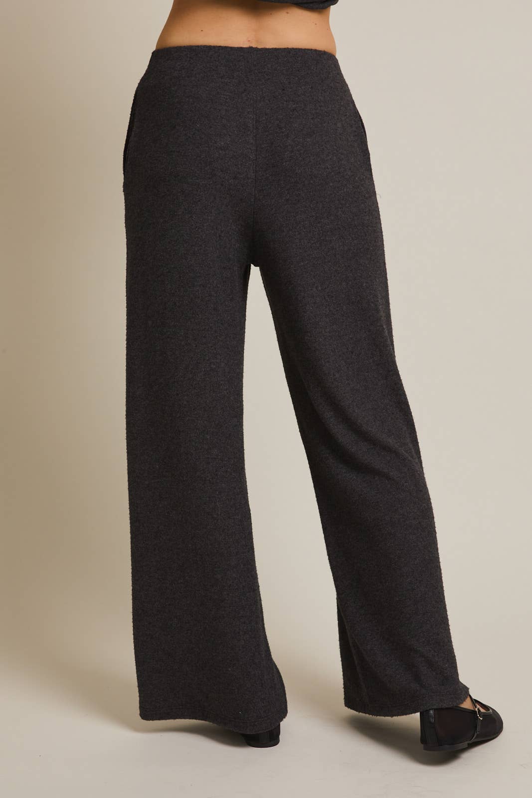 Heather gray pants on a neutral background