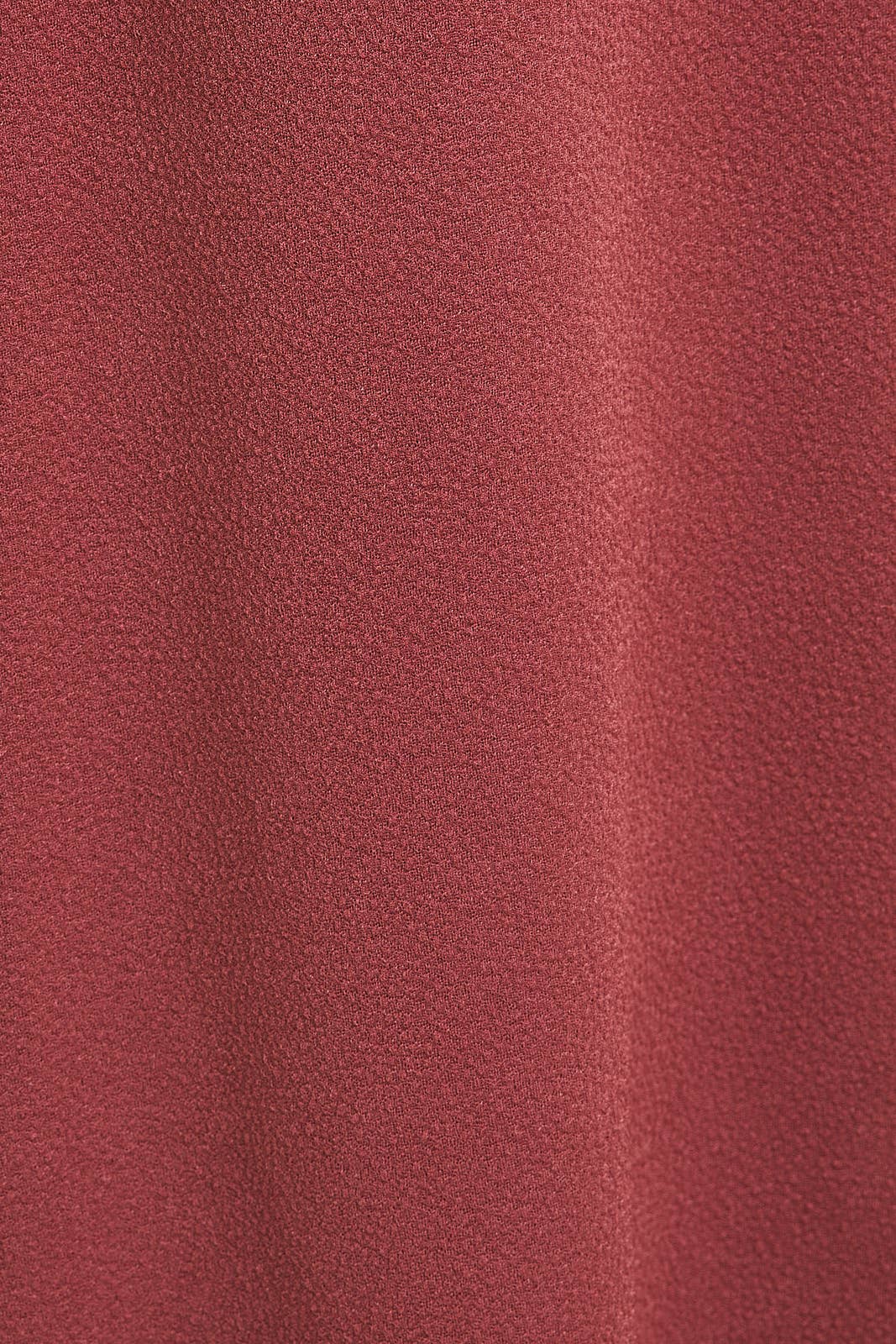 Close-up of a textured mauve fabric 
