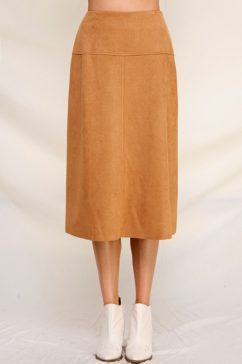 Woman wearing camel a-line microsuede midi skirt on a white background