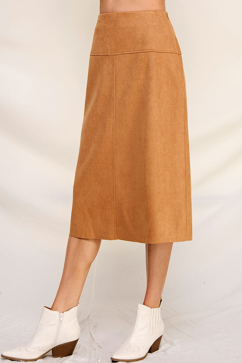 Woman wearing camel a-line microsuede midi skirt on a white background