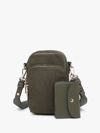 Corduroy three compartment crossbody bag with detachable strap and separate snap coin bag on a white background