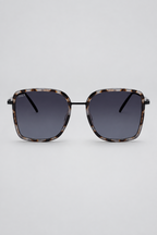 Grey cheetah sunglasses on a white background