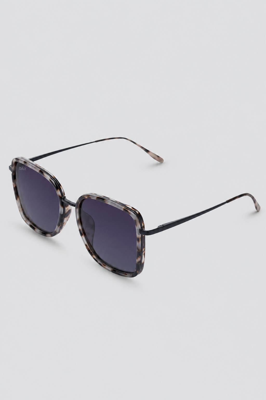 Sunglasses with cheetah pattern frame on a white background