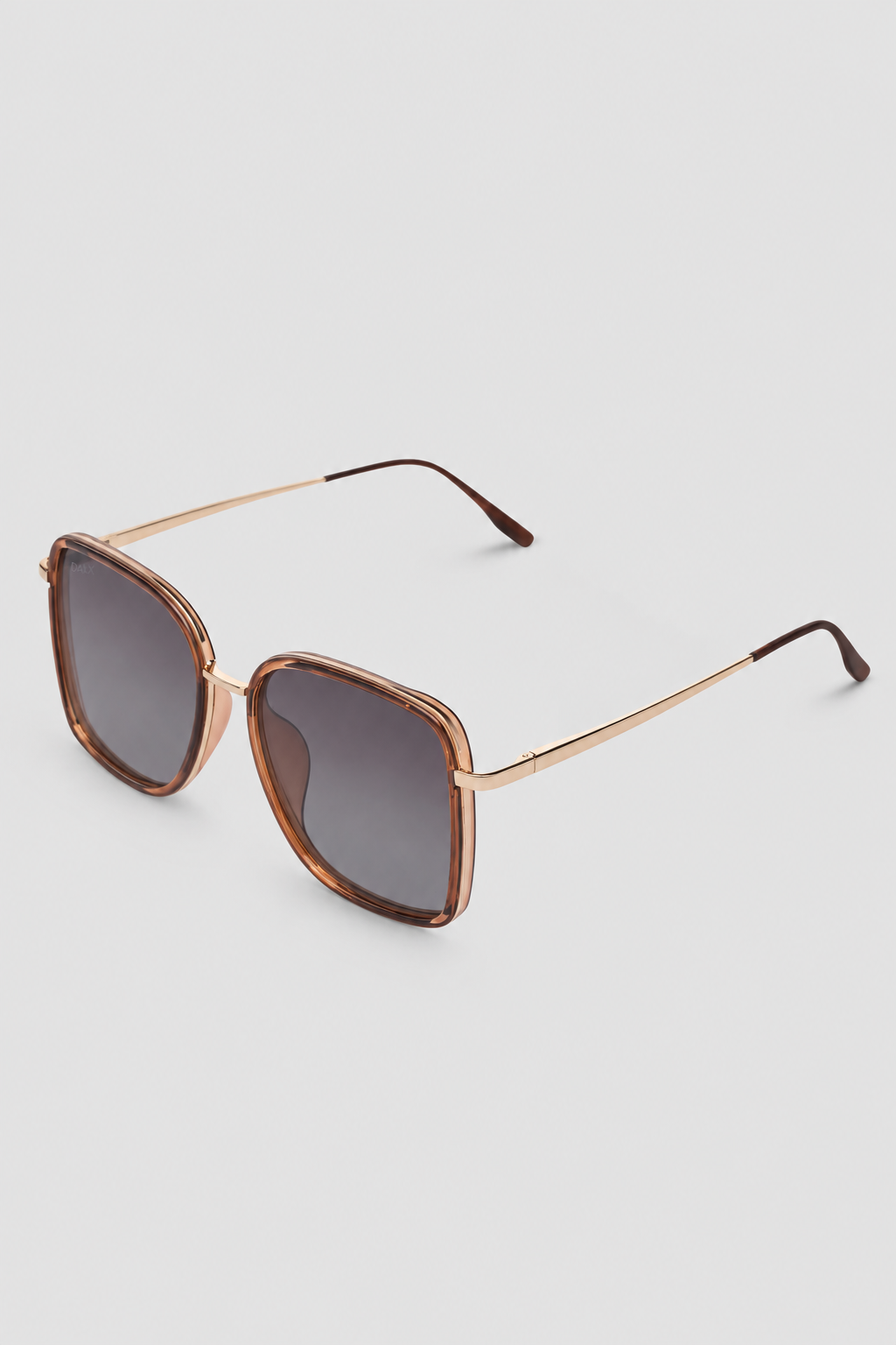 Sunglasses with brown frame and brown gradient lenses on a white background
