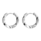 Pair of silver hoop earrings on a white background