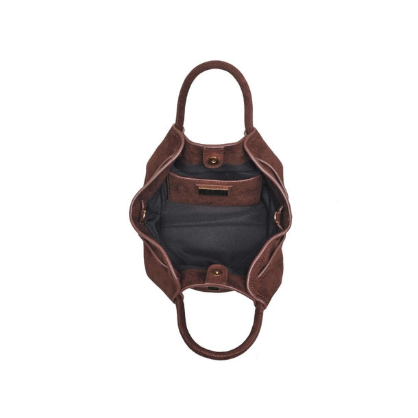 Open chocolate handbag with a strap on a white background