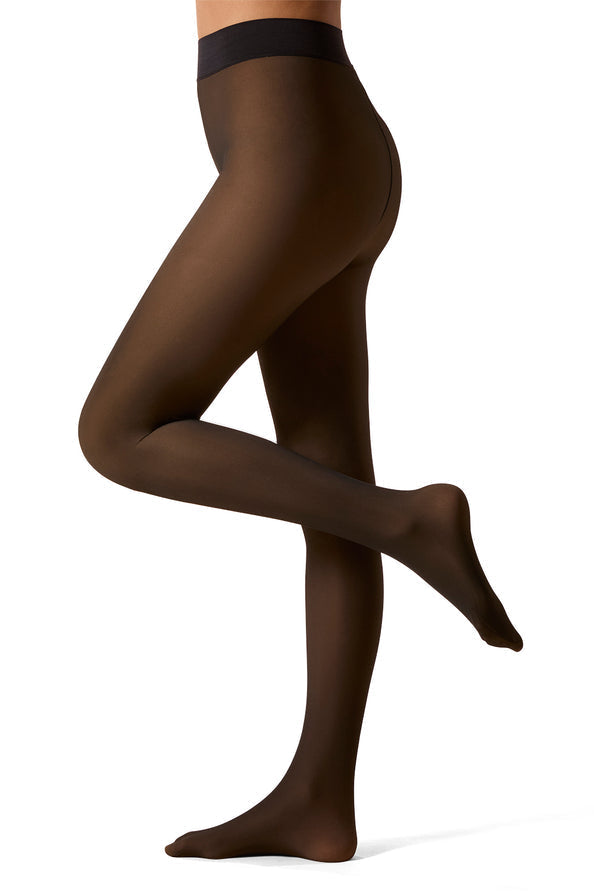 A model's lower body wearing sheer black fleece lined tights against a plain white background.