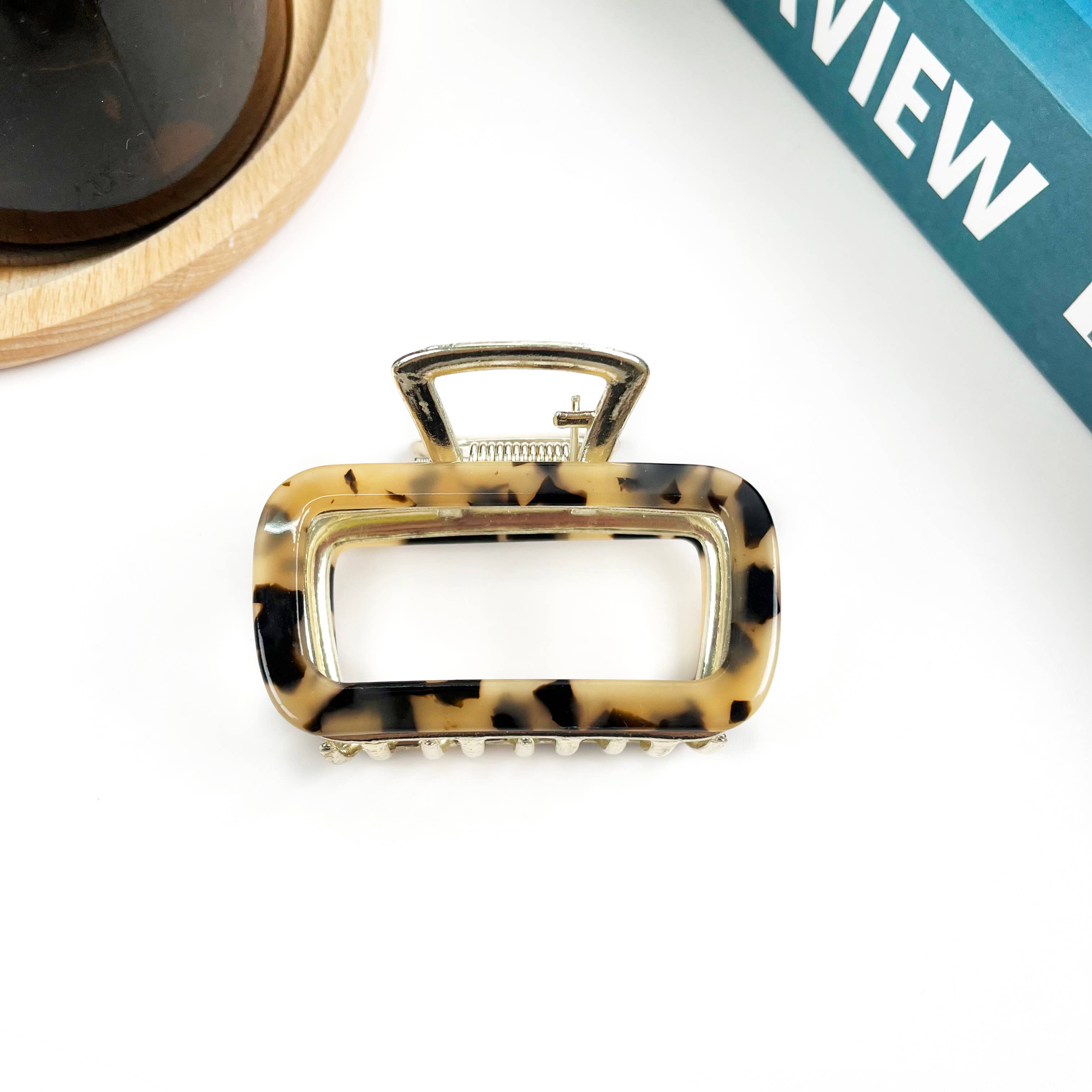 Tortoiseshell hair clip on a white background