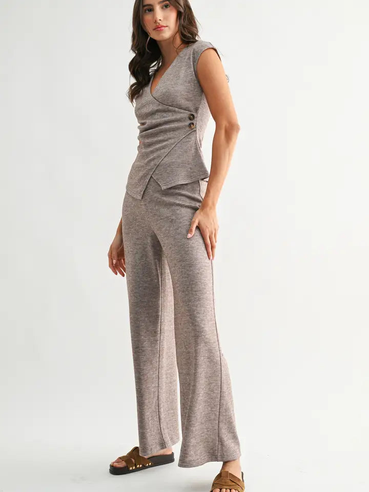 Woman wearing heather mocha knit wide leg pants and matching top on a white background