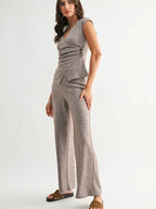 Woman wearing heather mocha knit wide leg pants and matching top on a white background