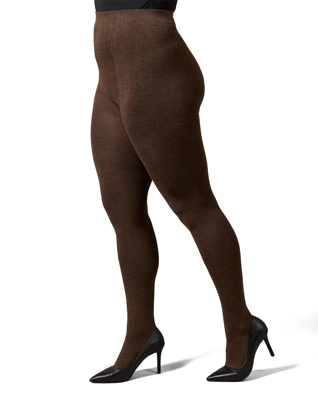 Woman wearing brown tights on a white background
