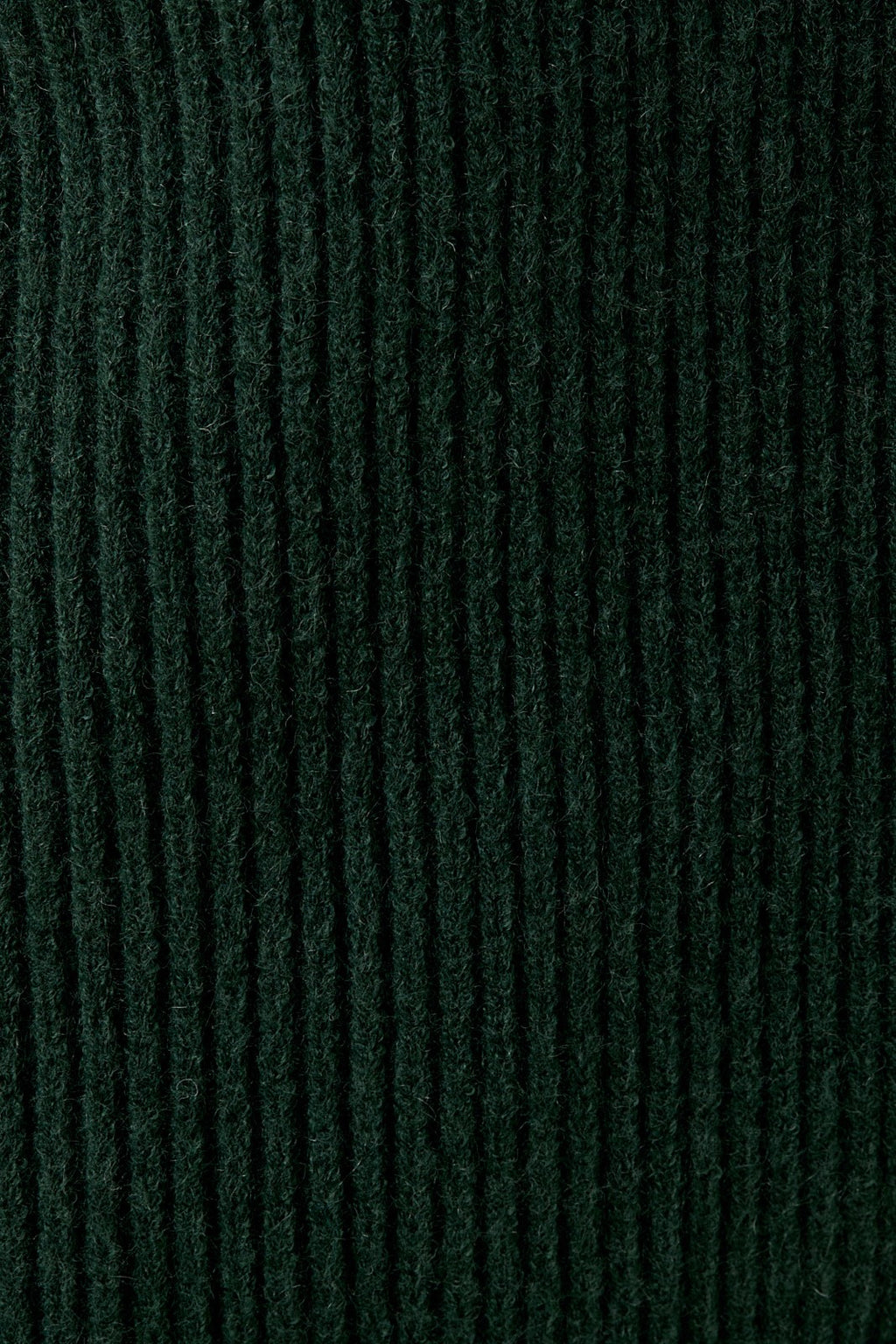Close-up of hunter green knit texture