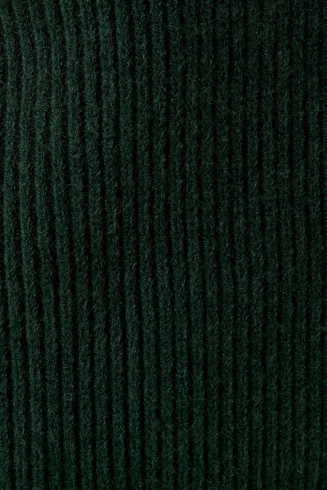 Close-up of hunter green knit texture