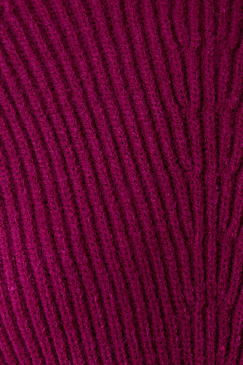 Close-up of a magenta knit pattern