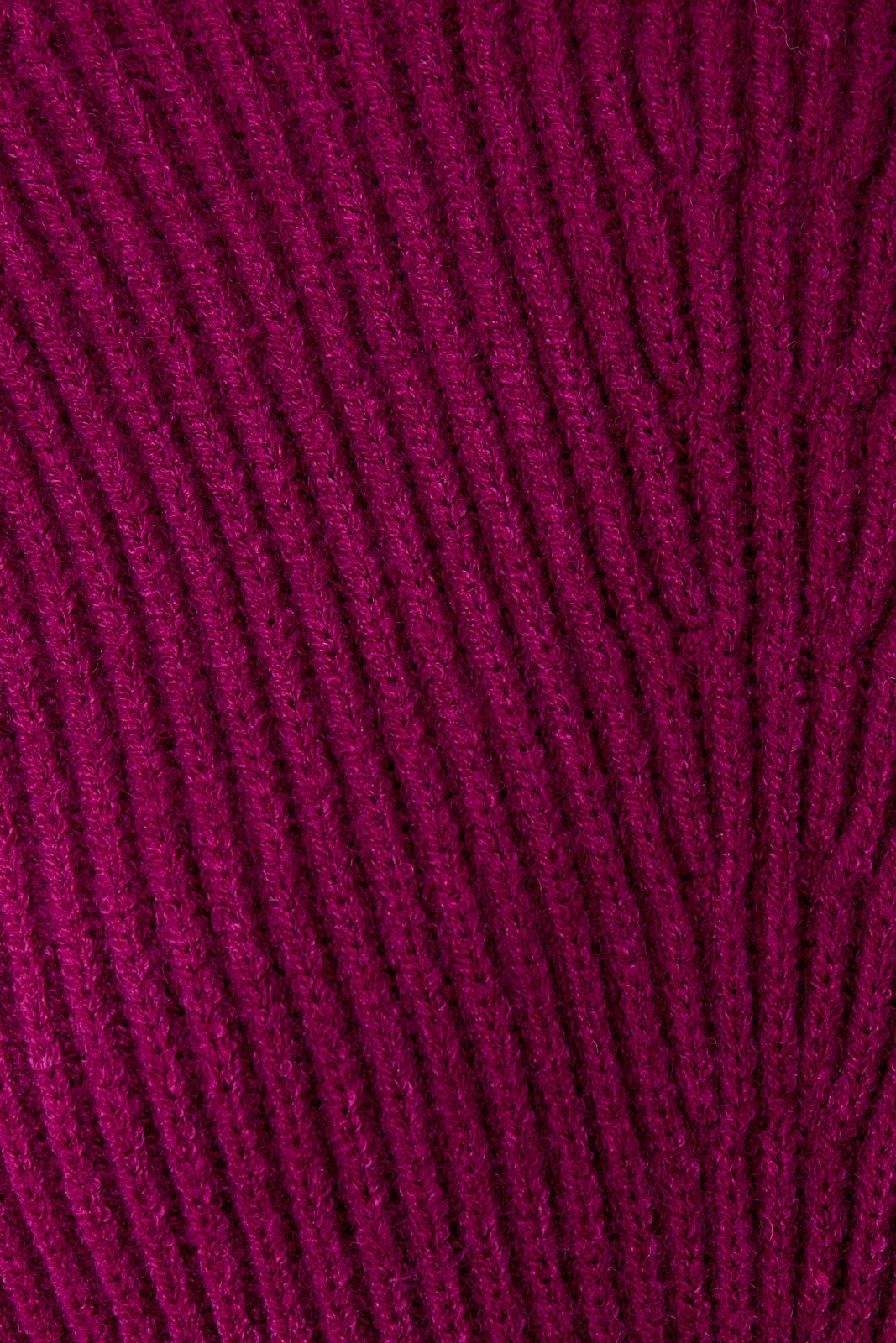Close-up of a magenta knit pattern