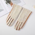 Taupe and white woven tweed gloves on a white background