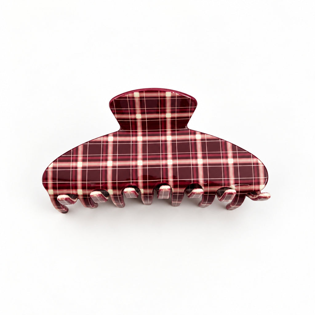 Berry red plaid hair clip on a white background