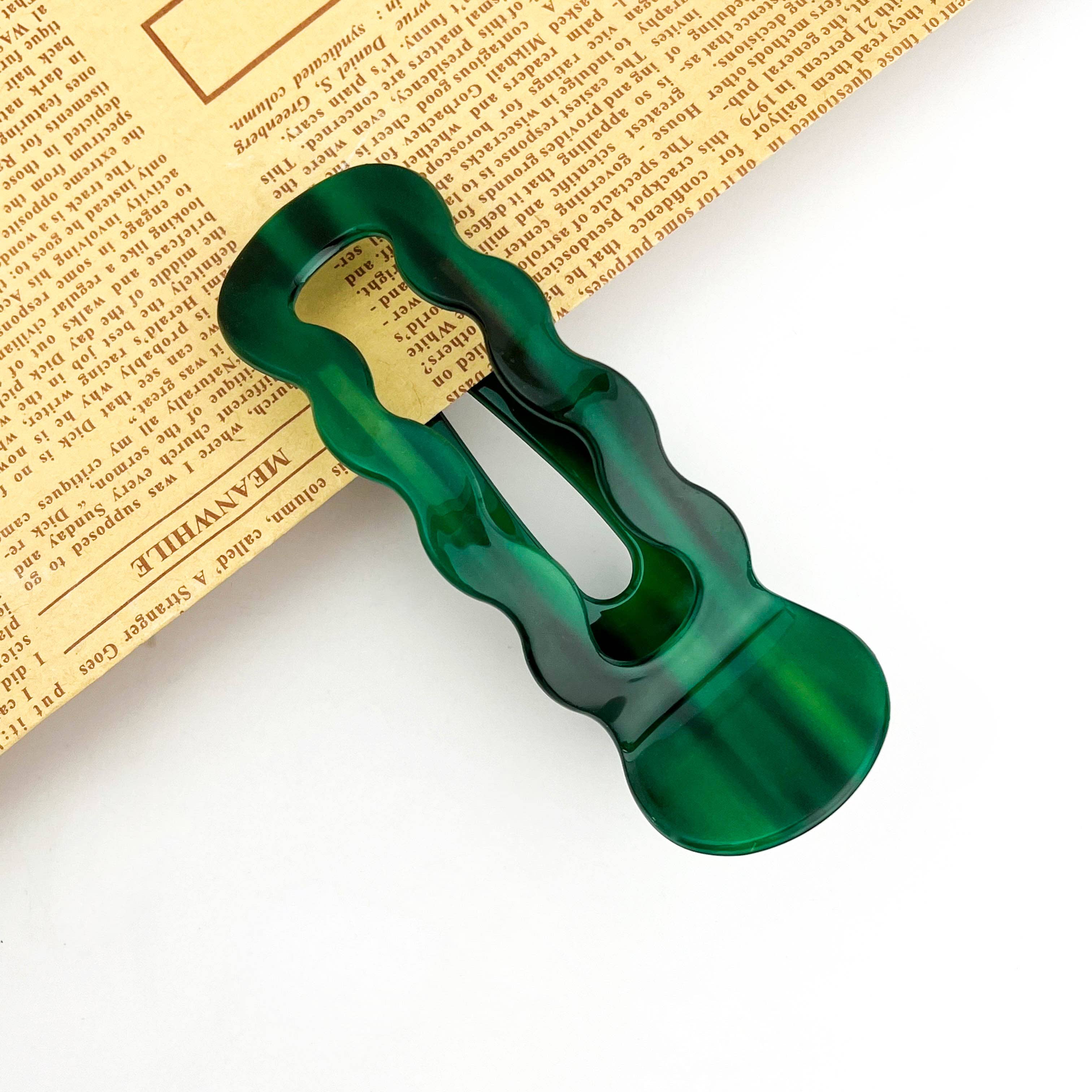 Wavy U-shaped hair clip on the white background