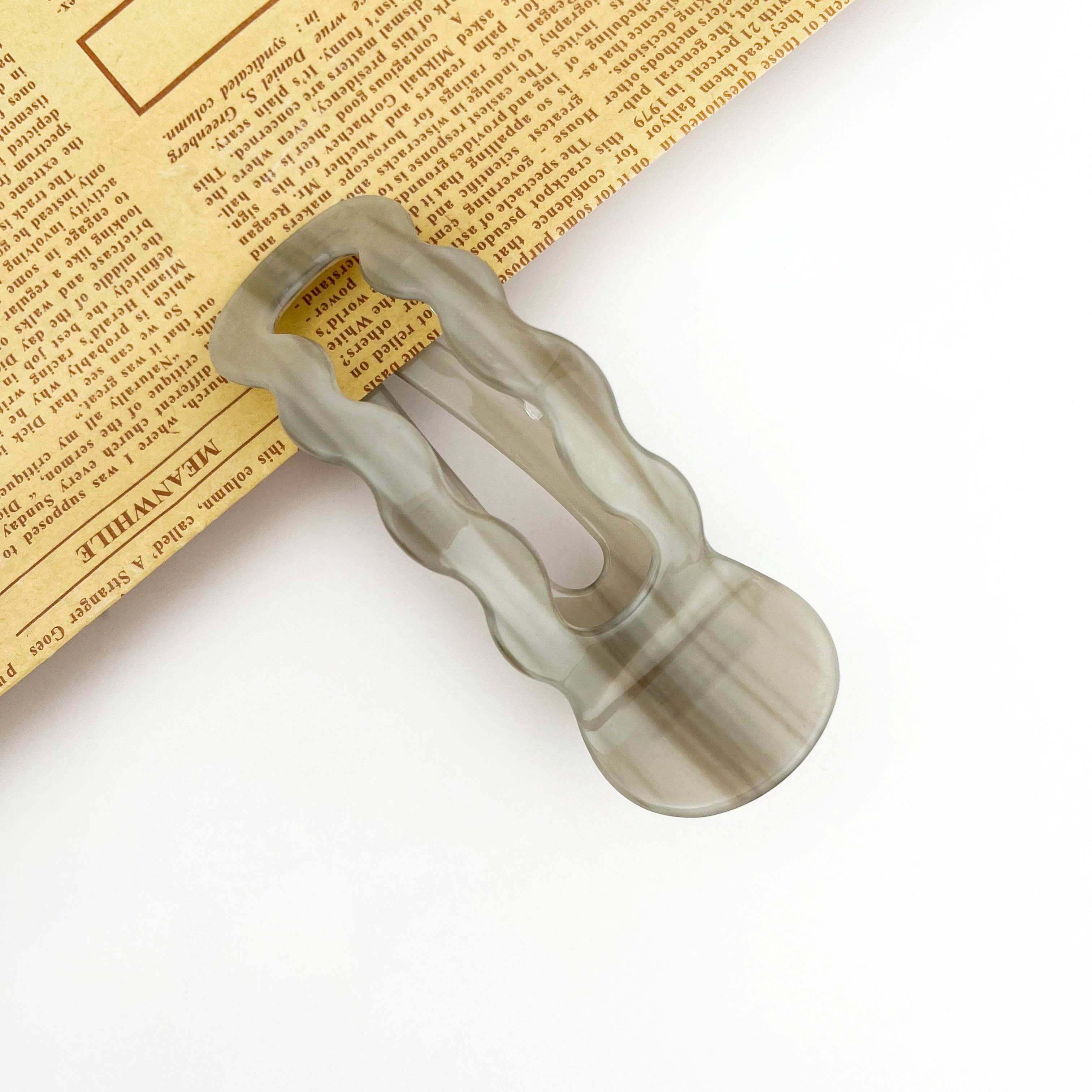Wavy U-shaped hair clip on the white background